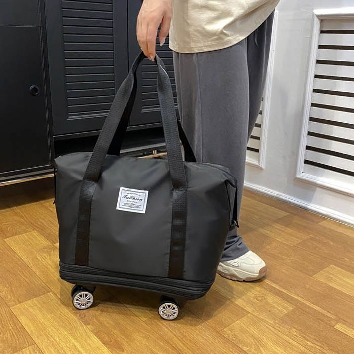 바퀴가방 3단계 수납량에 따라 높이를 조절할 수 있는 여행백